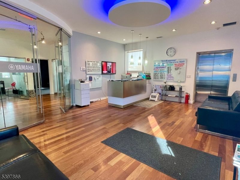 Elevator, Interior, Pendant Lights, Recessed Lighting, Wood Texture Flooring