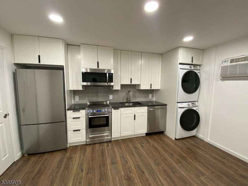 Interior, Kitchen, Recessed Lighting, Stainless Steel Appliances, Washer, Wood Texture Flooring