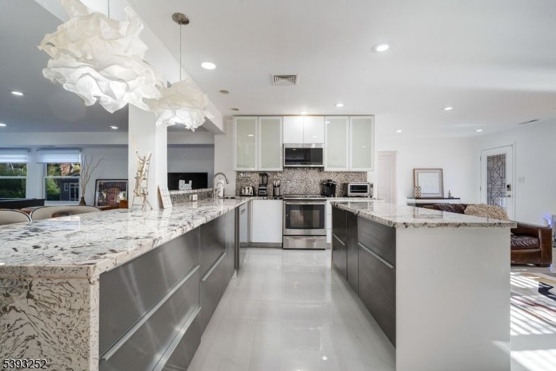 Fireplace, Interior, Kitchen, Pendant Lights, Recessed Lighting, Stainless Steel Appliances