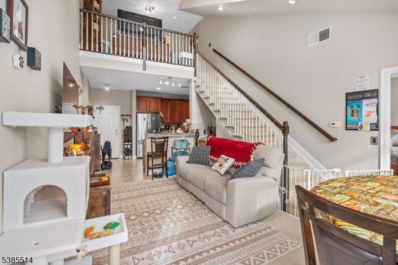 Fireplace, Interior, Kitchen, Living room, Recessed Lighting, Stainless Steel Appliances, Wood Texture Flooring