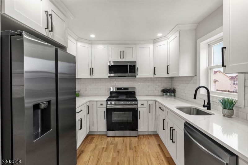 Interior, Kitchen, Recessed Lighting, Stainless Steel Appliances, Wood Texture Flooring