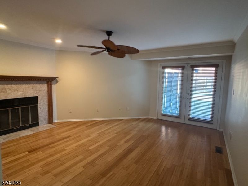 Empty room, Fireplace, Interior, Recessed Lighting, Wood Texture Flooring