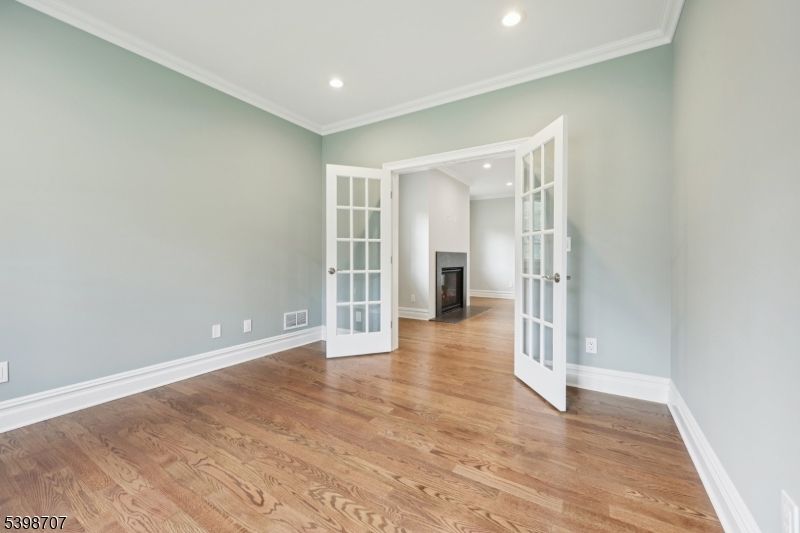 Empty room, Fireplace, Interior, Recessed Lighting, Wood Texture Flooring