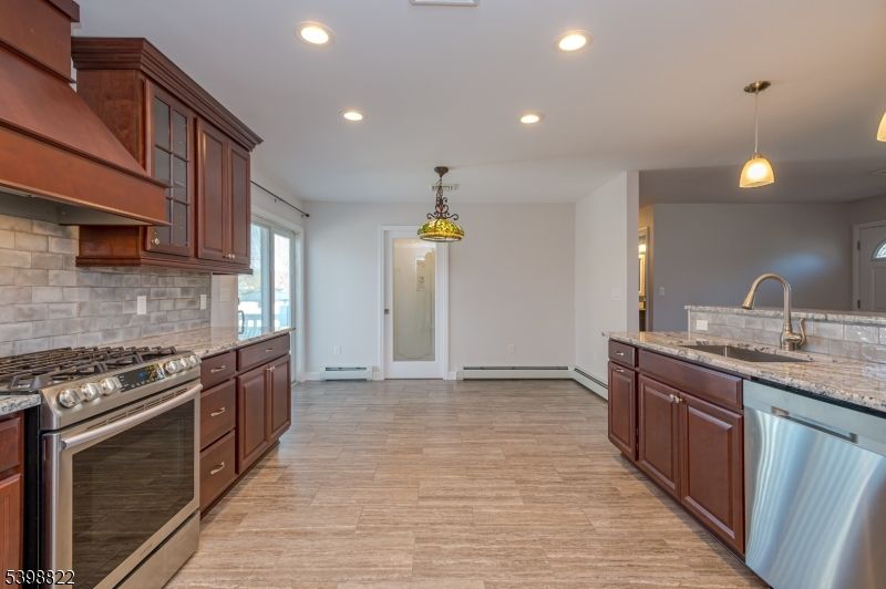Interior, Kitchen, Pendant Lights, Recessed Lighting, Stainless Steel Appliances, Wood Texture Flooring