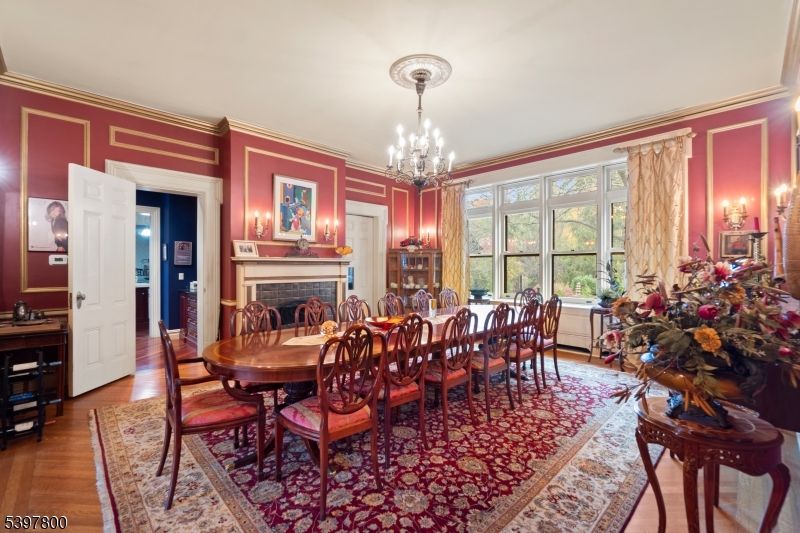 Chandelier, Dining room, Fireplace, Interior, Wood Texture Flooring