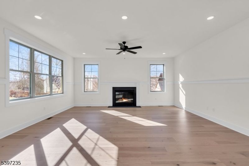 Empty room, Fireplace, Interior, Recessed Lighting, Wood Texture Flooring