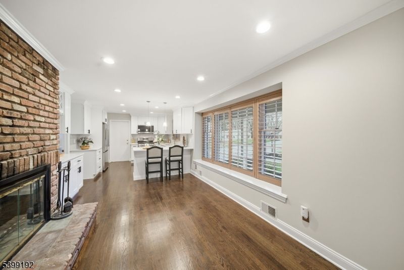 Fireplace, Interior, Kitchen, Pendant Lights, Recessed Lighting, Stone Walls, Wood Texture Flooring