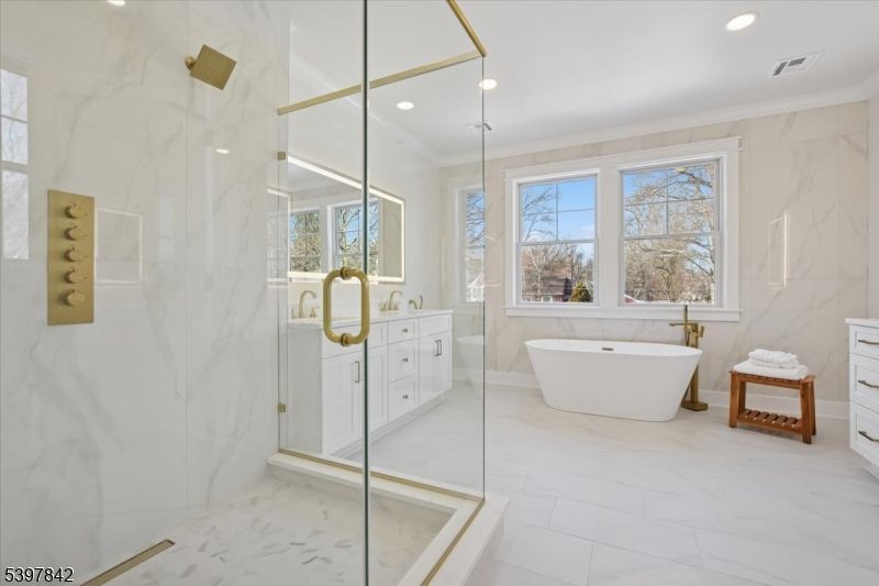 Bathroom, Free Standing Baths, Glass Shower, Interior, Marble, Marble Walls, Recessed Lighting