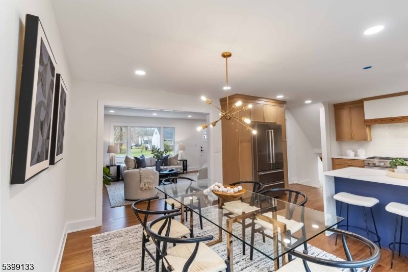 Dining room, Interior, Kitchen, Living room, Pendant Lights, Recessed Lighting, Stainless Steel Appliances, Wood Texture Flooring