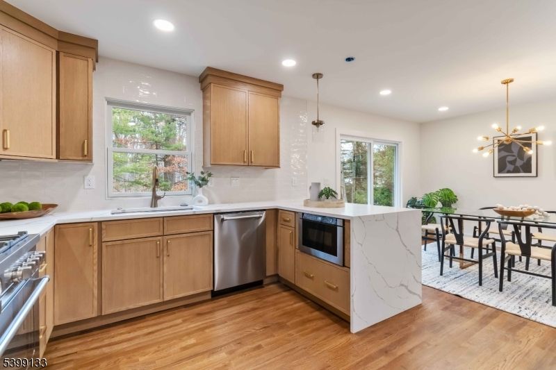 Dining room, Interior, Kitchen, Pendant Lights, Recessed Lighting, Stainless Steel Appliances, Wood Texture Flooring