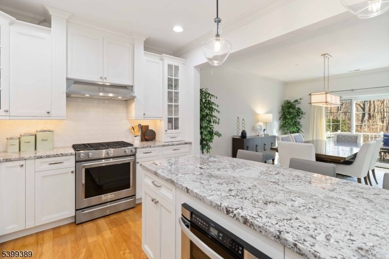 Dining room, Interior, Kitchen, Pendant Lights, Recessed Lighting, Stainless Steel Appliances, Wood Texture Flooring