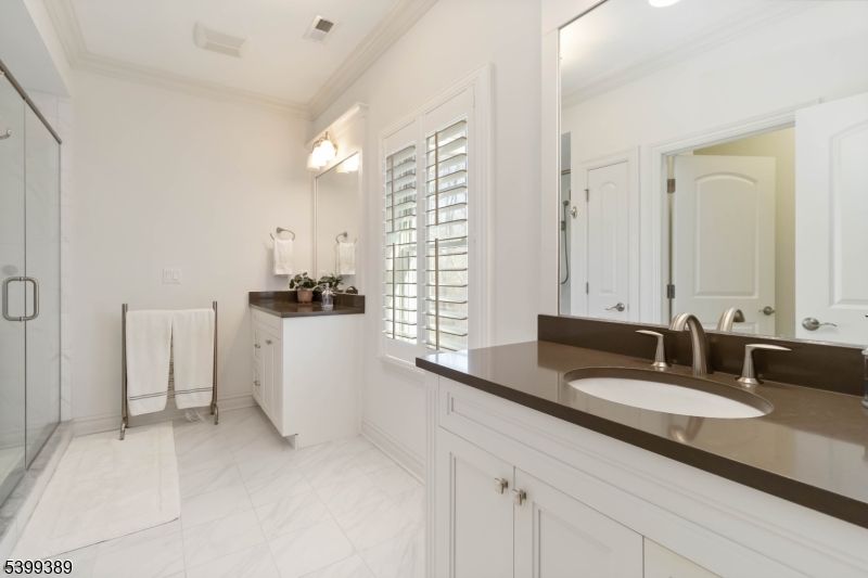 Bathroom, Dual Sink Vanities, Glass Shower, Interior, Marble, Recessed Lighting