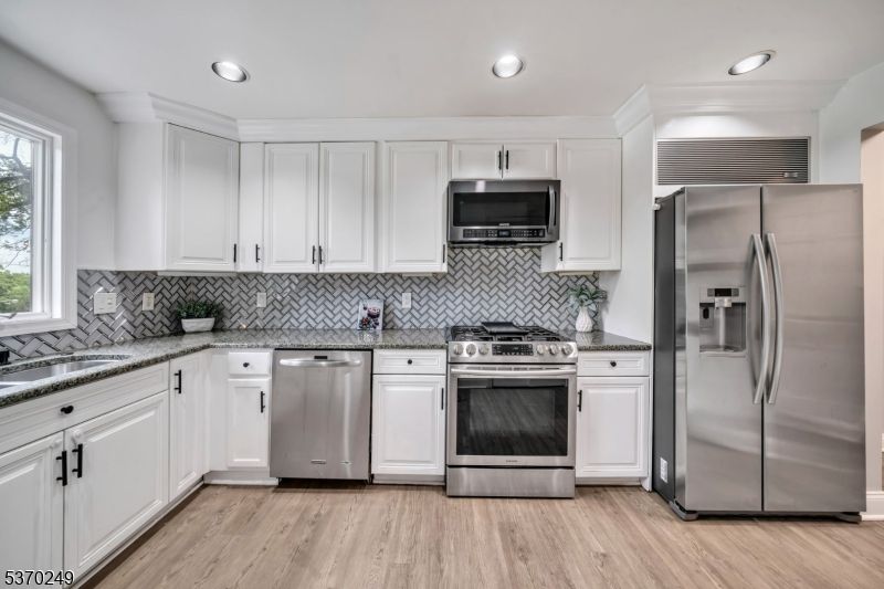 Interior, Kitchen, Recessed Lighting, Stainless Steel Appliances, Wood Texture Flooring