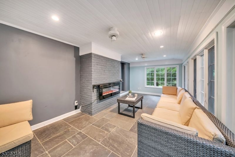 Fireplace, Interior, Living room, Recessed Lighting, Stone Walls