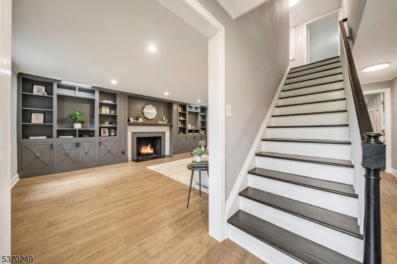 Fireplace, Interior, Recessed Lighting, Wood Texture Flooring