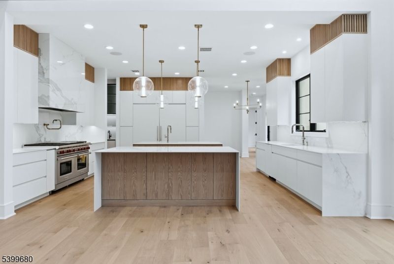 Interior, Kitchen, Marble Walls, Pendant Lights, Recessed Lighting, Stainless Steel Appliances, Wood Texture Flooring
