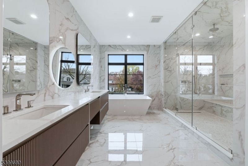 Bathroom, Dual Sink Vanities, Free Standing Baths, Glass Shower, Interior, Marble, Marble Walls, Recessed Lighting