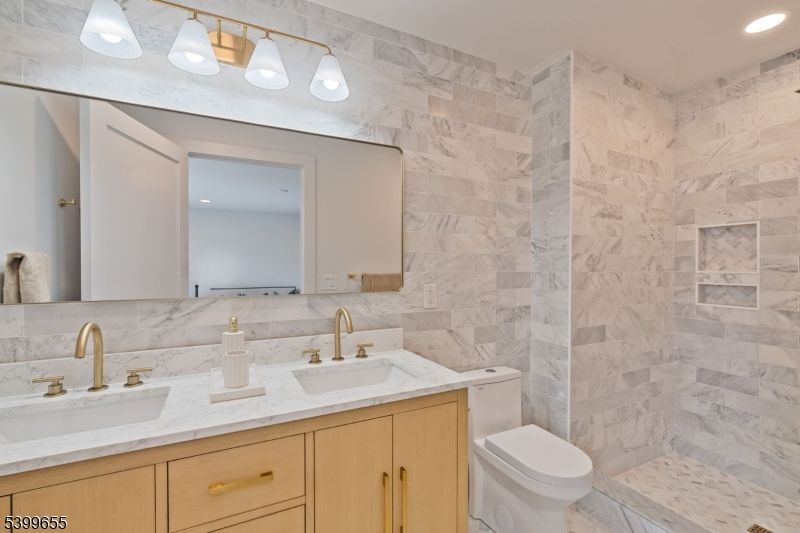 Bathroom, Dual Sink Vanities, Interior, Marble Walls, Recessed Lighting