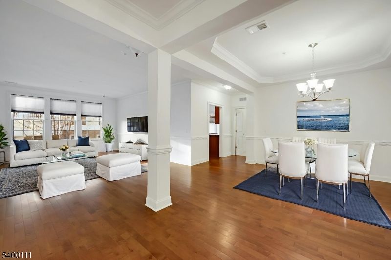 Chandelier, Dining room, Fireplace, Interior, Living room, Recessed Lighting, Wood Texture Flooring