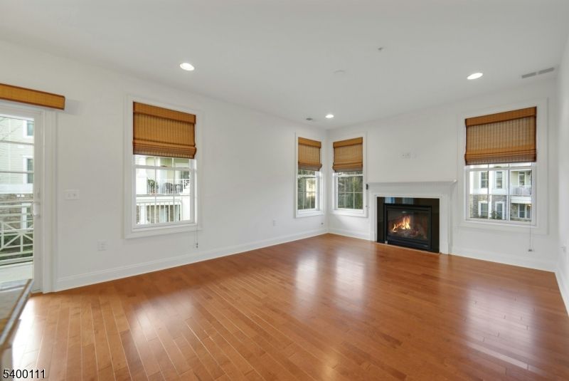 Empty room, Fireplace, Interior, Recessed Lighting, Wood Texture Flooring