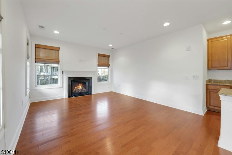 Empty room, Fireplace, Interior, Recessed Lighting, Wood Texture Flooring