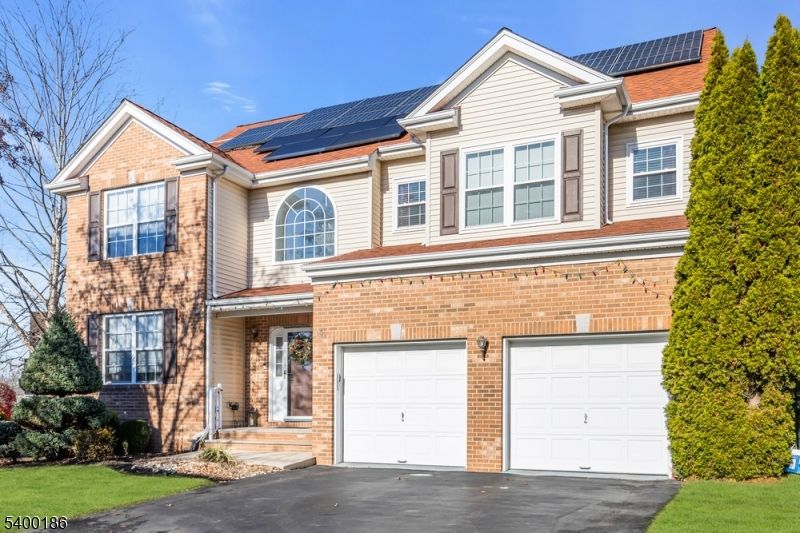 Attached, Exterior, Facade, Brick Facade, Solar Panels, Brick Traditional