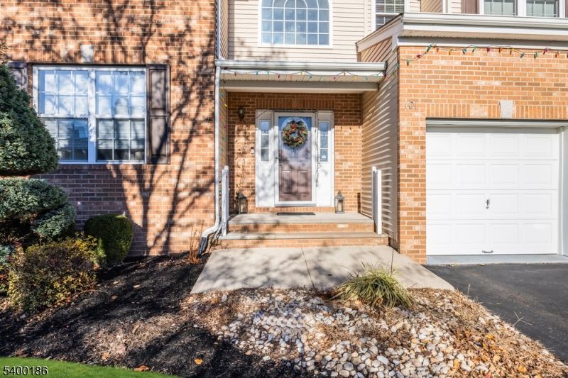 Attached, Exterior, Facade, Brick Facade, None