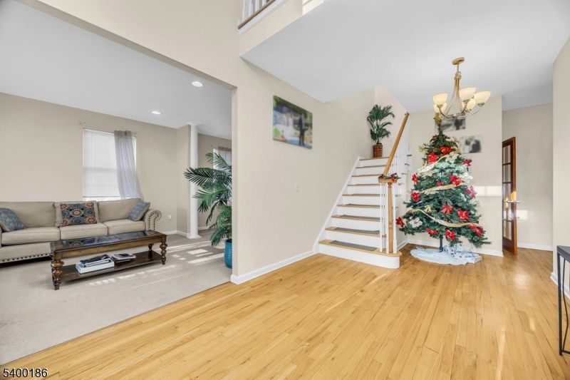Chandelier, Interior, Living room, Recessed Lighting, Wood Texture Flooring