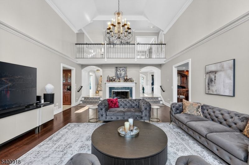 Chandelier, Fireplace, Interior, Living room, Recessed Lighting, Wood Texture Flooring