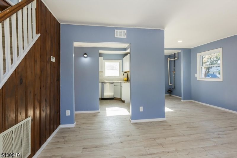 Empty room, Interior, Kitchen, Recessed Lighting, Wood Texture Flooring, Wooden Walls