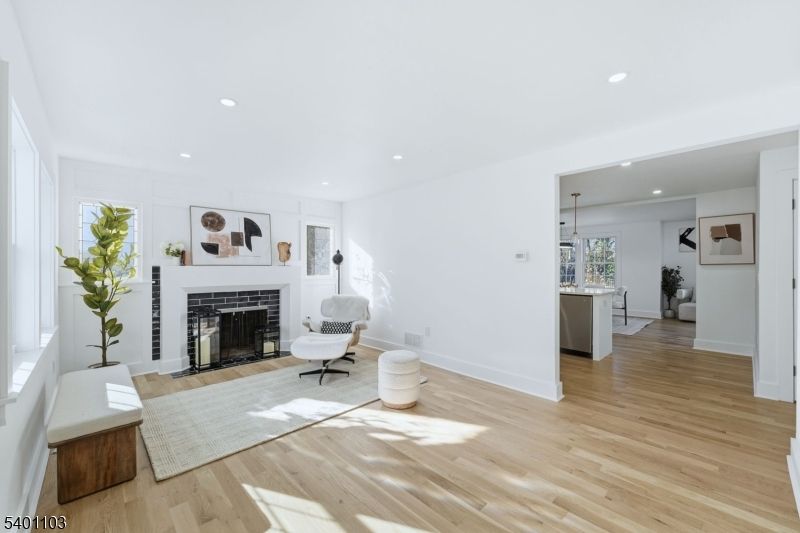 Fireplace, Interior, Pendant Lights, Recessed Lighting, Wood Texture Flooring