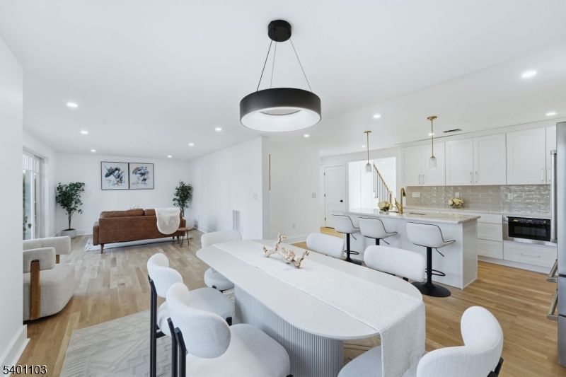 Dining room, Interior, Kitchen, Living room, Pendant Lights, Recessed Lighting, Wood Texture Flooring