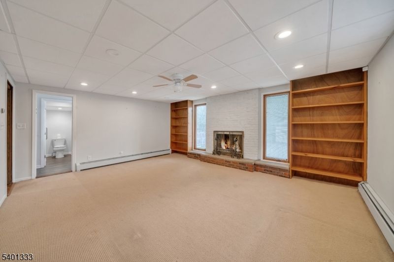 Bathroom, Empty room, Fireplace, Interior, Recessed Lighting, Stone Walls