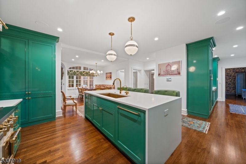 Chandelier, Fireplace, Interior, Kitchen, Pendant Lights, Recessed Lighting, Wood Texture Flooring