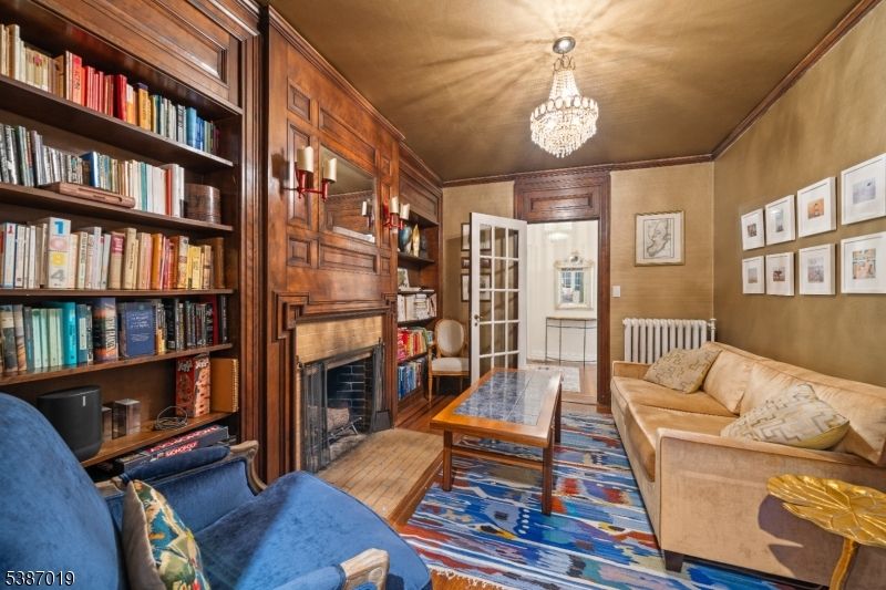 Chandelier, Fireplace, Interior, Living room, Wood Texture Flooring, Wooden Walls