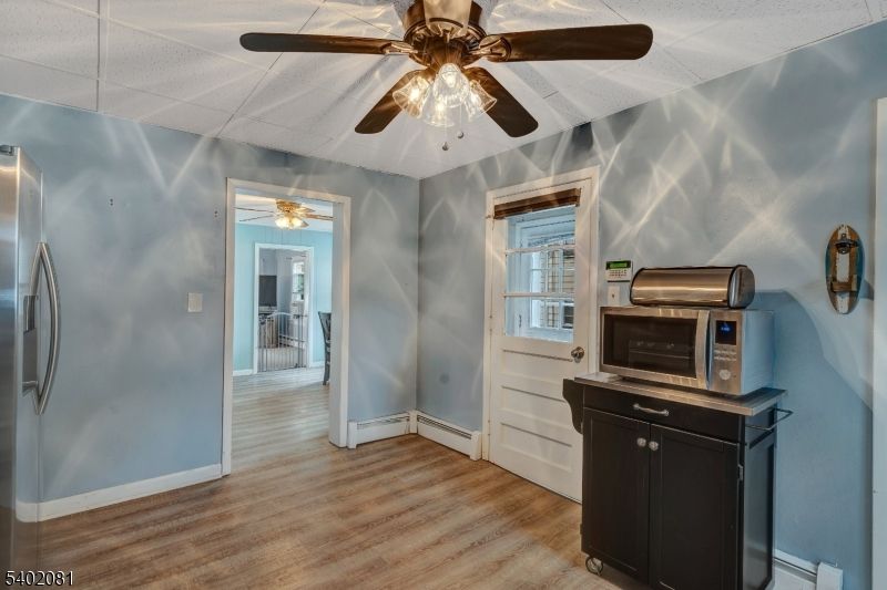 Empty room, Interior, Stainless Steel Appliances, Wood Texture Flooring
