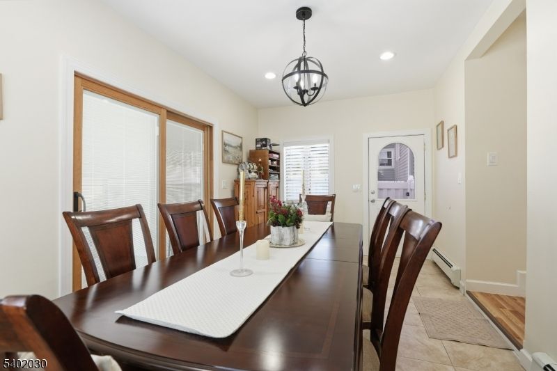 Chandelier, Dining room, Interior, Pendant Lights, Recessed Lighting, Wood Texture Flooring