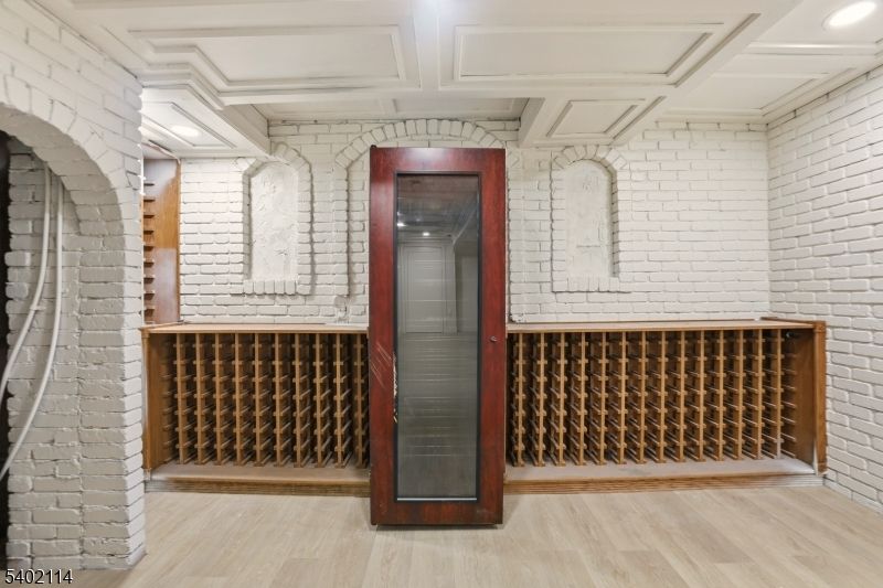 Interior, Recessed Lighting, Stone Walls, Wine Storage, Wood Texture Flooring