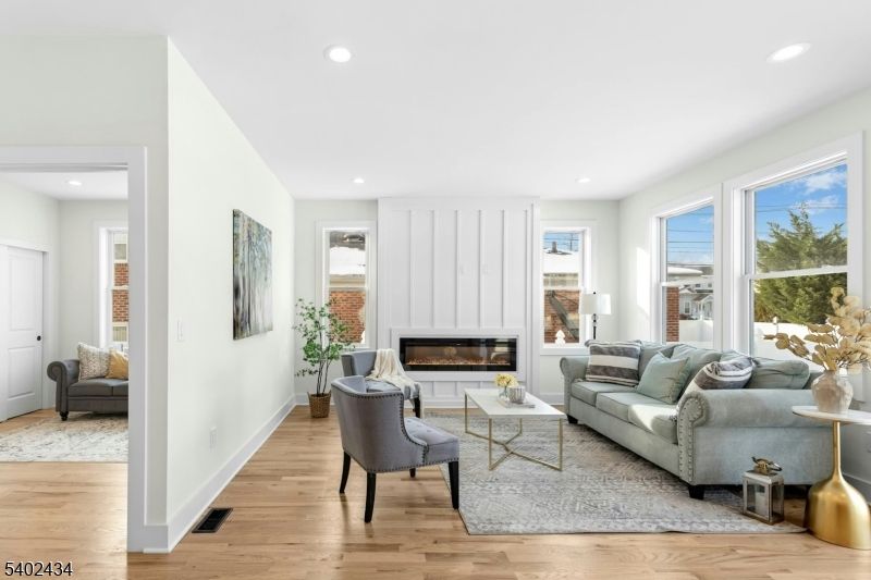 Fireplace, Interior, Living room, Recessed Lighting, Wood Texture Flooring