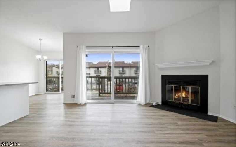 Chandelier, Empty room, Fireplace, Interior, Pendant Lights, Wood Texture Flooring