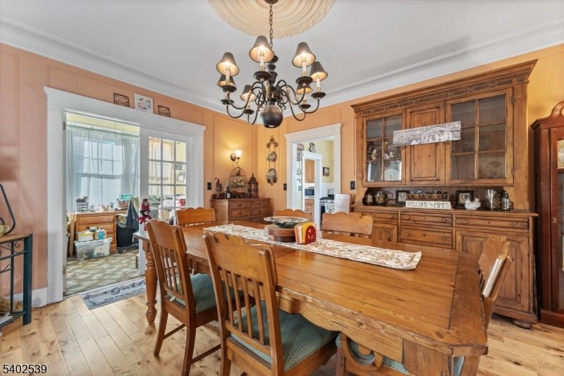 Chandelier, Dining room, Interior, Wood Texture Flooring