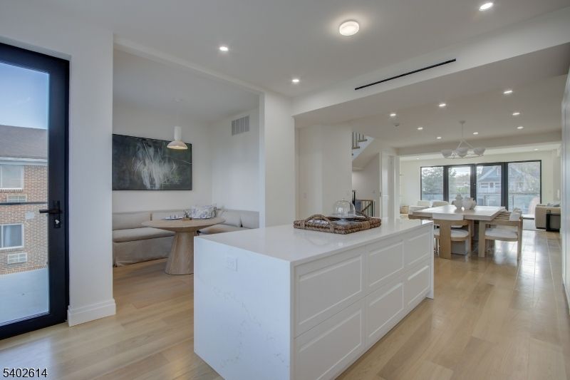 Dining room, Interior, Living room, Pendant Lights, Recessed Lighting, Wood Texture Flooring