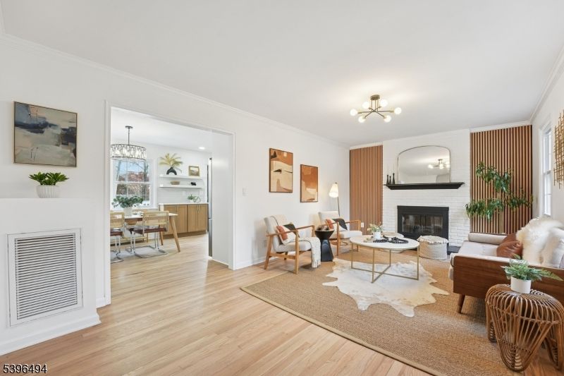 Chandelier, Dining room, Fireplace, Interior, Living room, Pendant Lights, Wood Texture Flooring