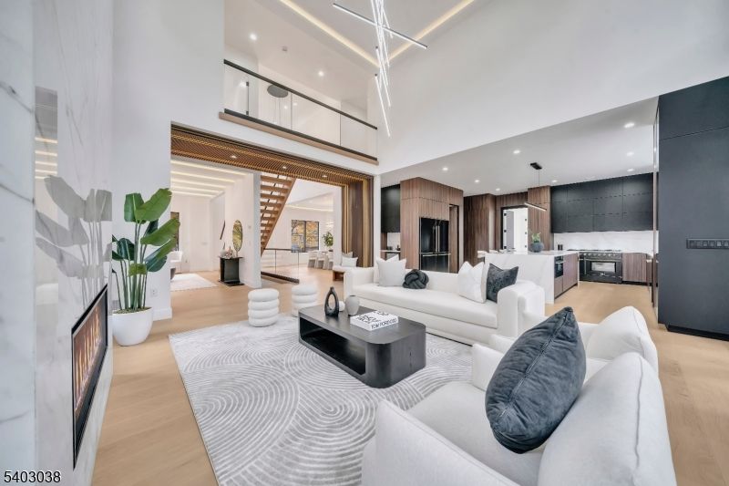 Fireplace, Interior, Kitchen, Living room, Pendant Lights, Recessed Lighting, Stainless Steel Appliances, Wood Texture Flooring