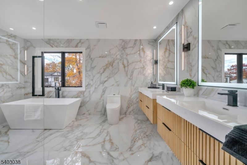 Bathroom, Dual Sink Vanities, Free Standing Baths, Interior, Marble, Marble Walls, Recessed Lighting