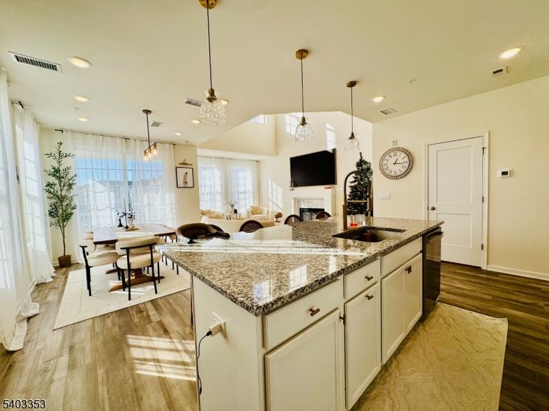 Dining room, Fireplace, Interior, Kitchen, Living room, Pendant Lights, Recessed Lighting, Wood Texture Flooring