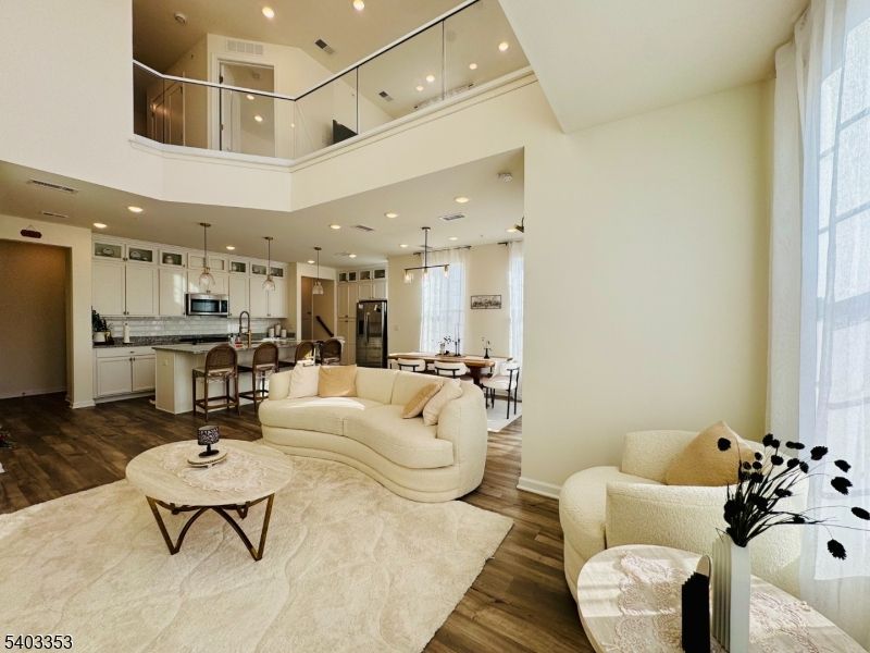 Dining room, Interior, Kitchen, Living room, Pendant Lights, Recessed Lighting, Stainless Steel Appliances, Wood Texture Flooring