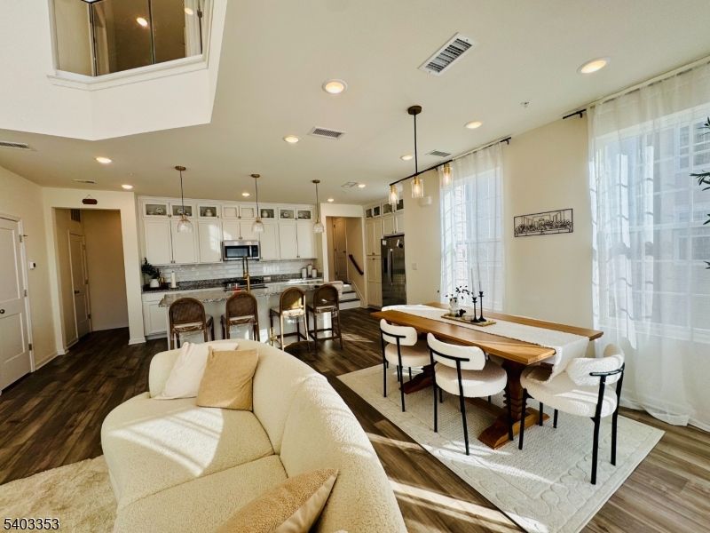 Dining room, Interior, Kitchen, Living room, Pendant Lights, Recessed Lighting, Stainless Steel Appliances, Wood Texture Flooring