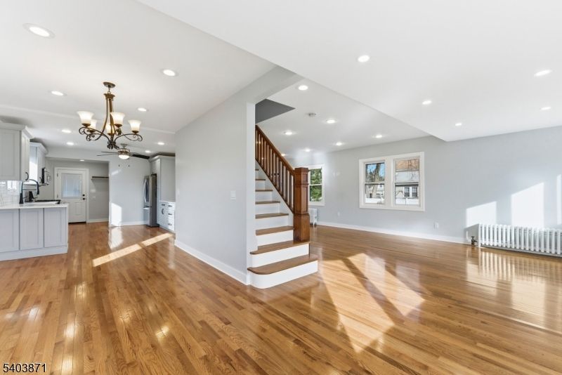 Chandelier, Empty room, Interior, Kitchen, Recessed Lighting, Wood Texture Flooring