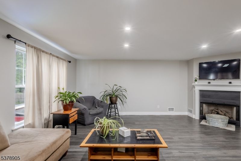 Fireplace, Interior, Living room, Recessed Lighting, Wood Texture Flooring